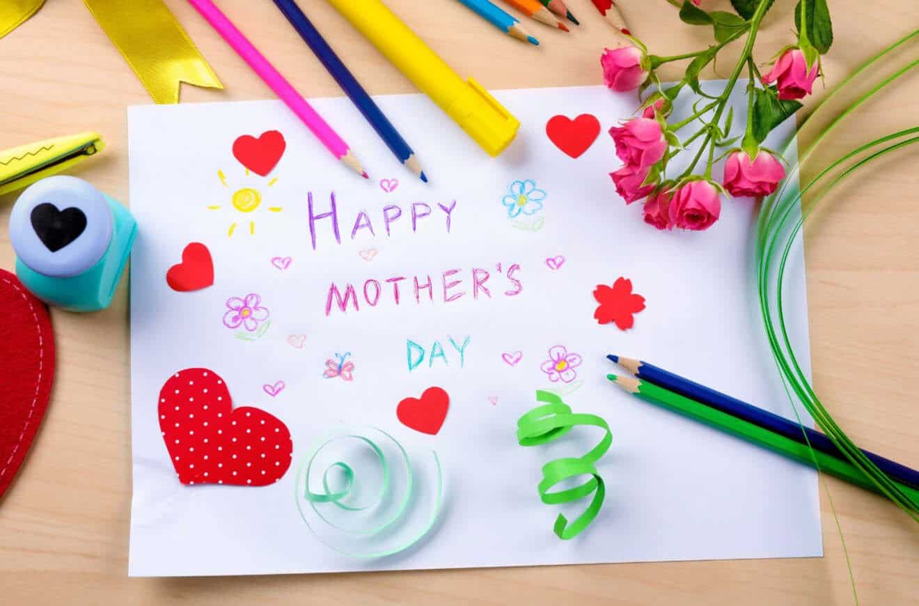 Mother's Day card with colorful flowers and pens, perfect for showing appreciation to mom.