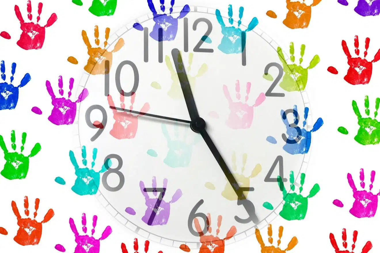 A clock with black hands pointing to 10:10 is overlaid on a background of colorful handprints.