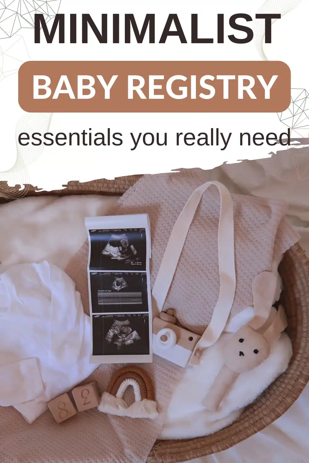 A wicker basket contains baby essentials including a soft toy, a wooden camera, baby clothes, wooden blocks, a rainbow toy, and ultrasound photos. Text above reads "Minimalist Baby Registry essentials you really need.